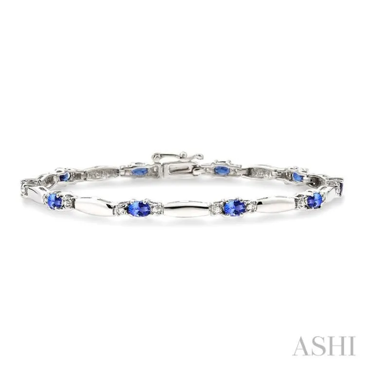5x3 MM Oval Cut Tanzanite and 1/10 ctw Bar and Oval Mount Round Cut Diamond  Precious Bracelet in 10K White Gold