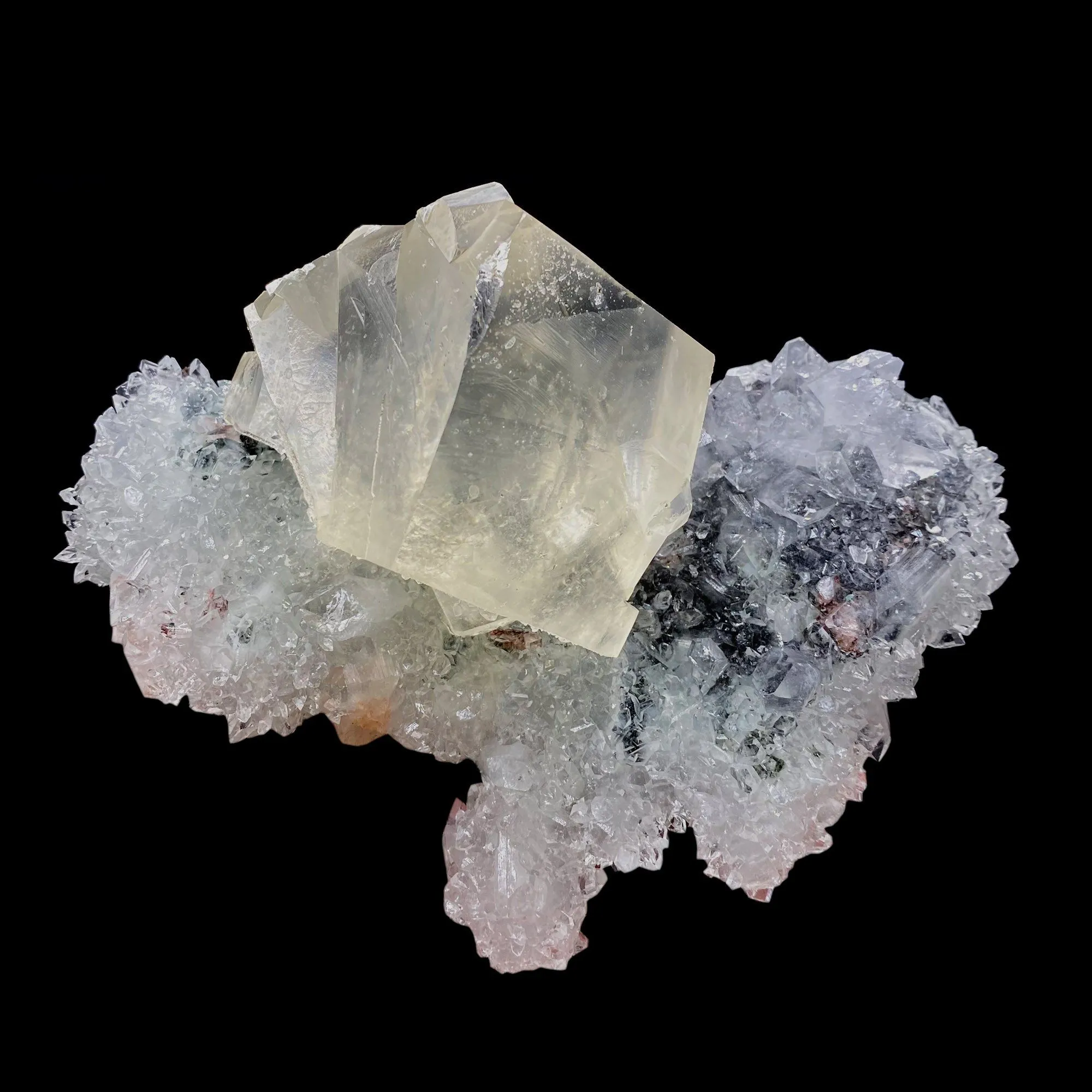 Calcite with Apophyllite on Heuladnite # Q9