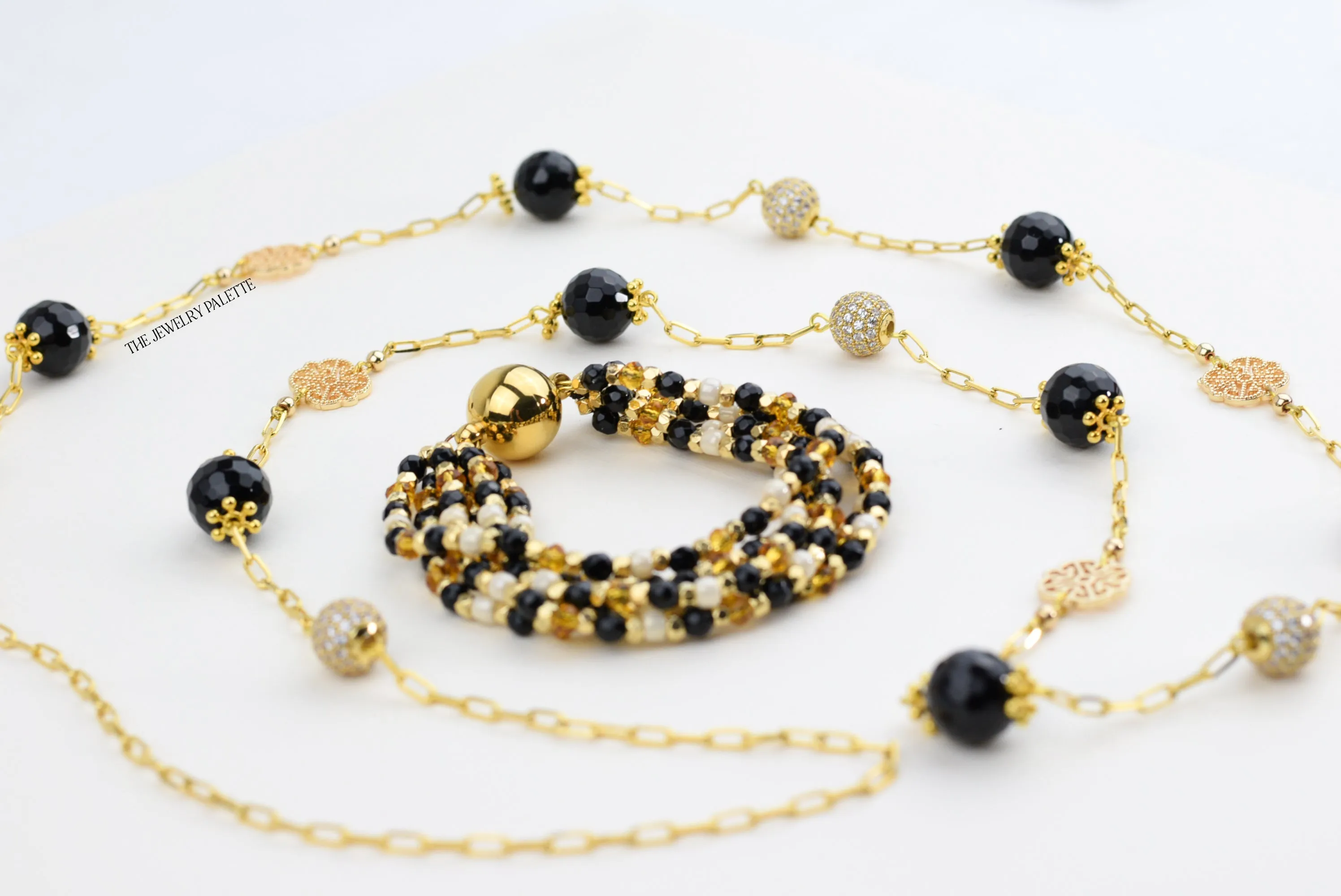 Hajr multitier black and gold bracelet