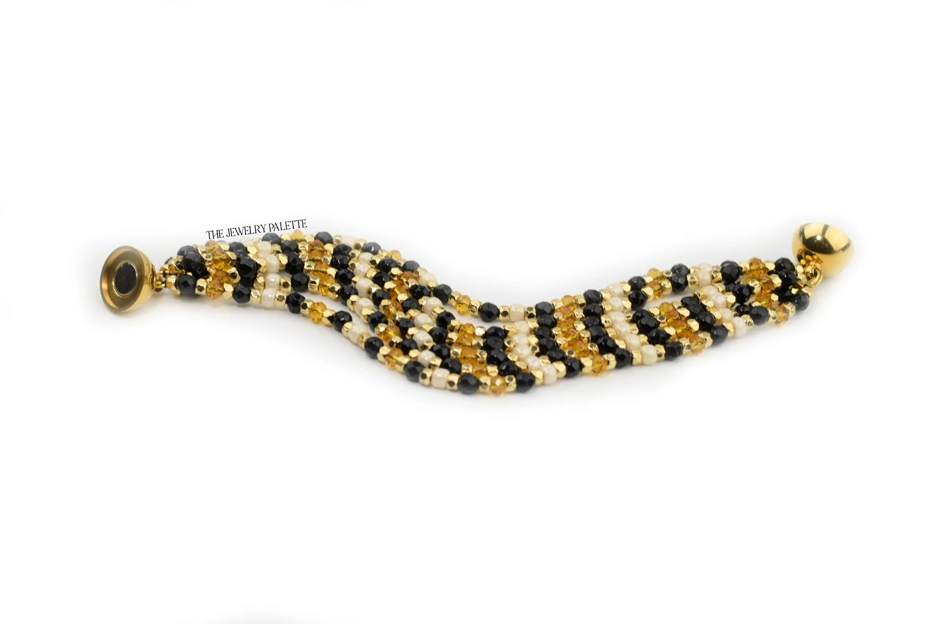 Hajr multitier black and gold bracelet